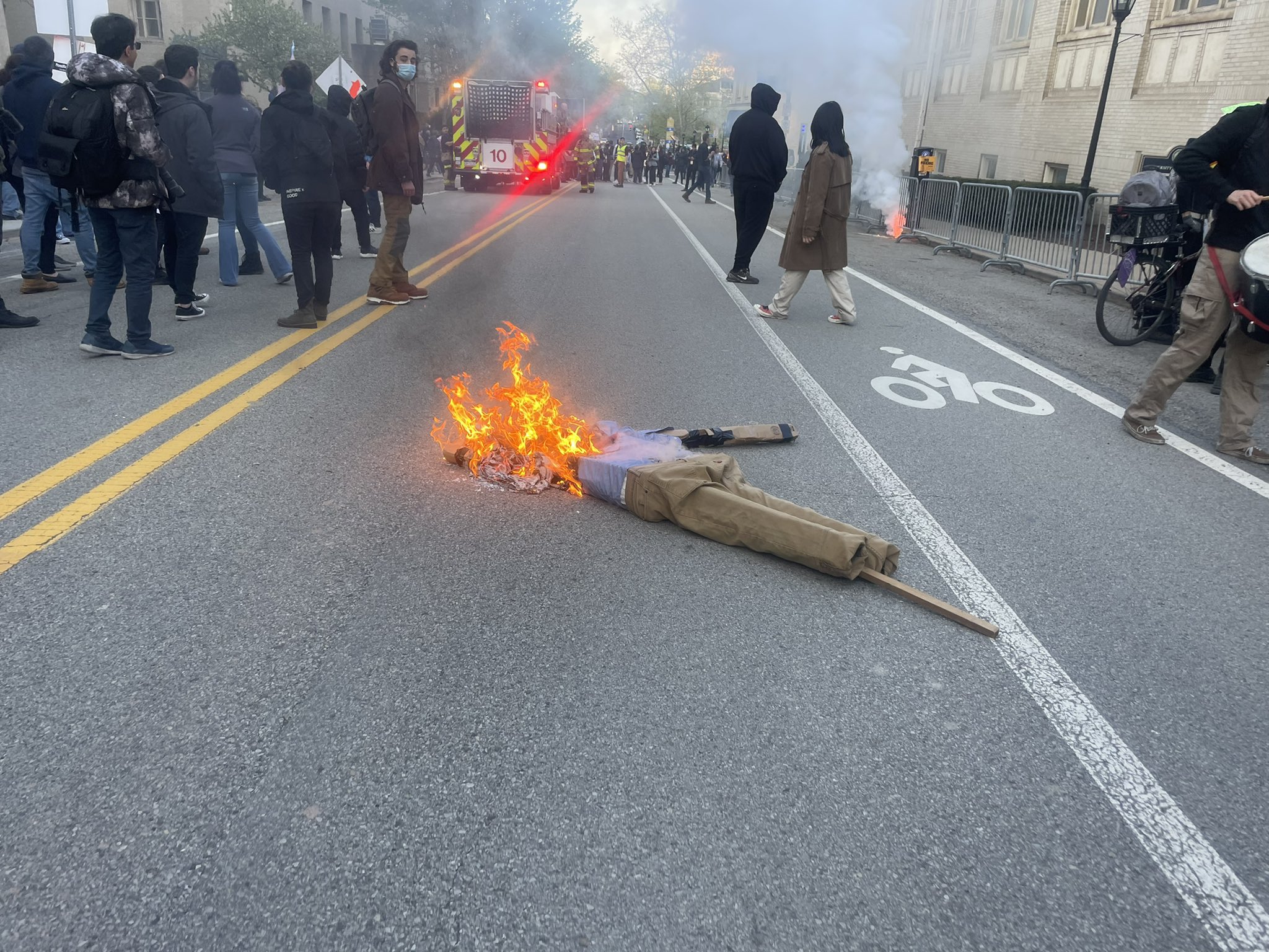 Effigy of Michael Knowles with a Hitler mustache is burned outside of his scheduled appearance at University of Pittsburgh