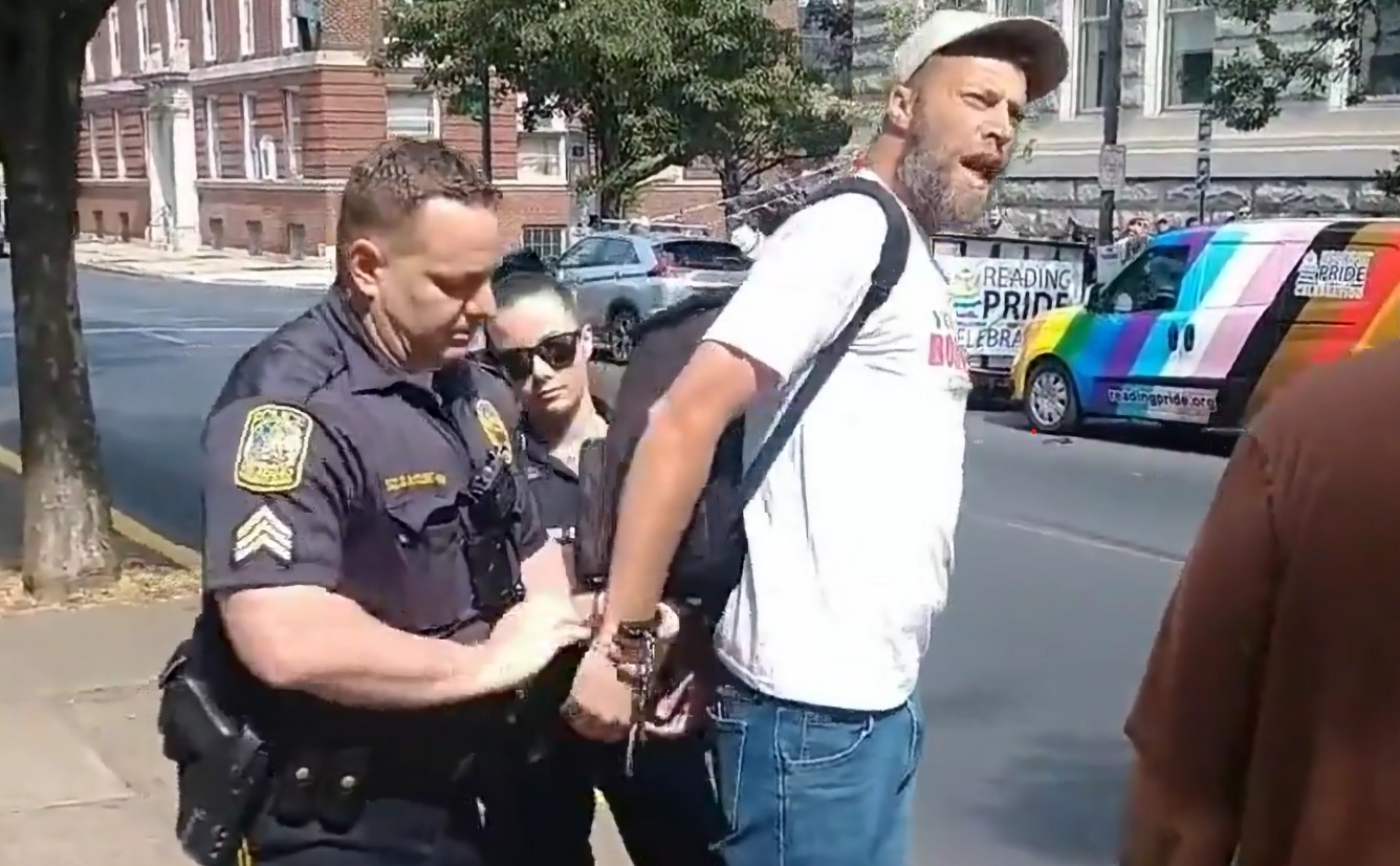 Man arrested by police officer after speaking bible verses during a Pride event.