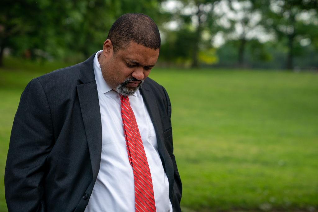 Manhattan District Attorney Alvin Braggat prays at a National Gun Violence Day of Awareness vigil on June 3, 2022 in New York City.