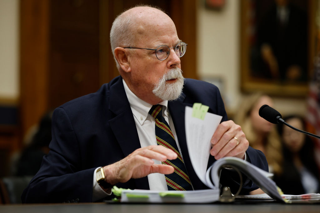 Special Counsel John Durham leafs through his report while testifying to the House Judiciary Committee in the Rayburn House Office Building on Capitol Hill on June 21, 2023 in Washington, DC. Durham was tasked by former Attorney General William Barr and the Trump administration to investigate the origins of the FBI's investigation into Russian interference in the 2016 U.S. elections. After four years of work, Durham's report highlighted FBI agents withholding key information from judges, disregarded reasons not to investigate Trump's campaign and yielded only one conviction - a guilty plea from a little-known FBI employee - and two acquittals at trial.