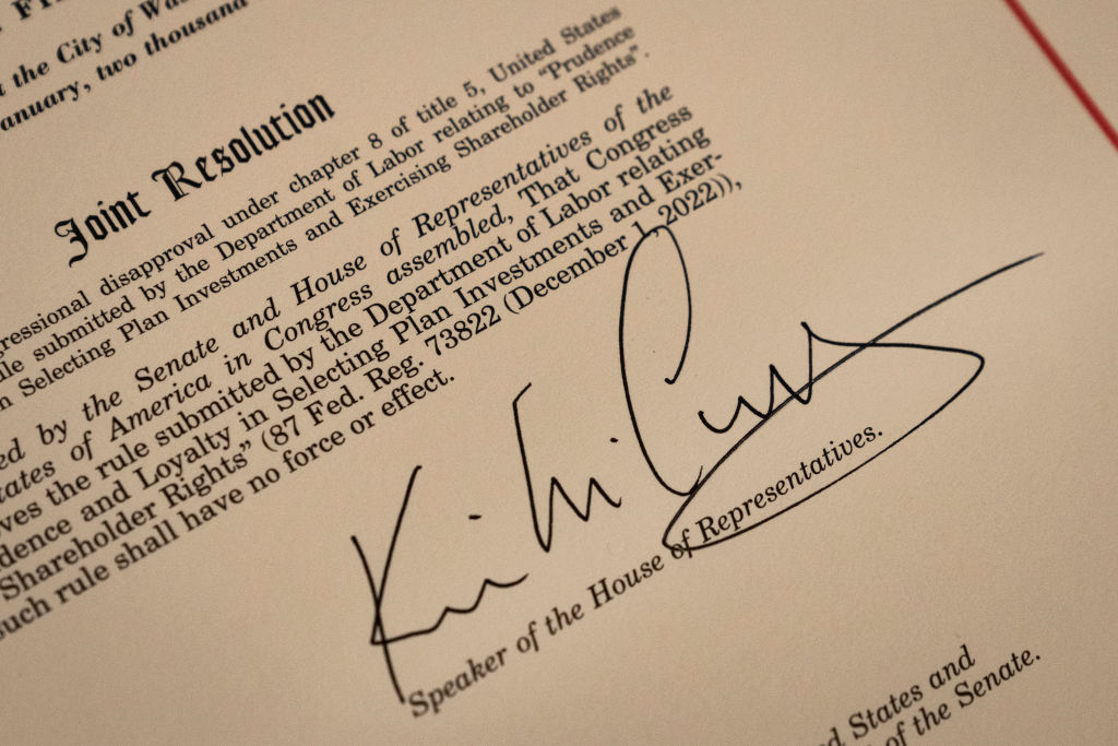 The signature of Speaker of the House Kevin McCarthy (R-CA) is seen on a resolution passed by the House and Senate that aims to block a Biden administration rule encouraging retirement managers to consider environmental, social and corporate governance (ESG) factors when making investment decisions, during a bill signing at the U.S. Capitol March 9, 2023 in Washington, DC.