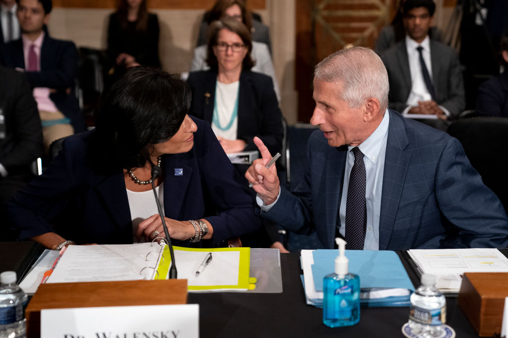 Rochelle Walensky, Director of the Centers for Disease Control and Prevention and Dr. Anthony Fauci, Director of the National Institute of Allergy and Infectious Diseases speak prior to a Senate Health, Education, Labor, and Pensions Committee at the Dirksen Senate Office Building on July 20, 2021 in Washington, DC.