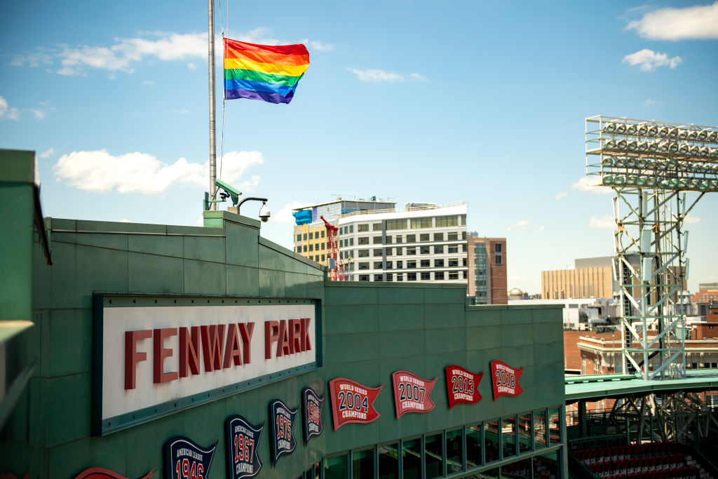 Boston Red Sox fly LGBTQ Pride flag above the Green Monster at Fenway Park