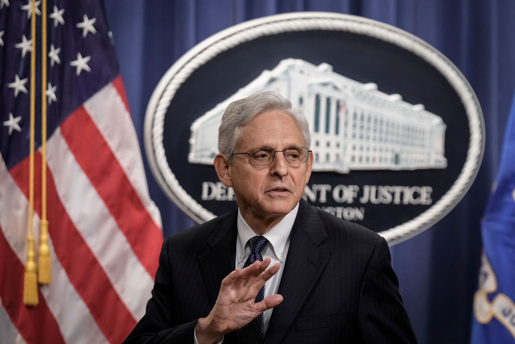 U.S. Attorney General Merrick Garland explains to reporters that he will not take questions after he delivered a statement at the U.S. Department of Justice