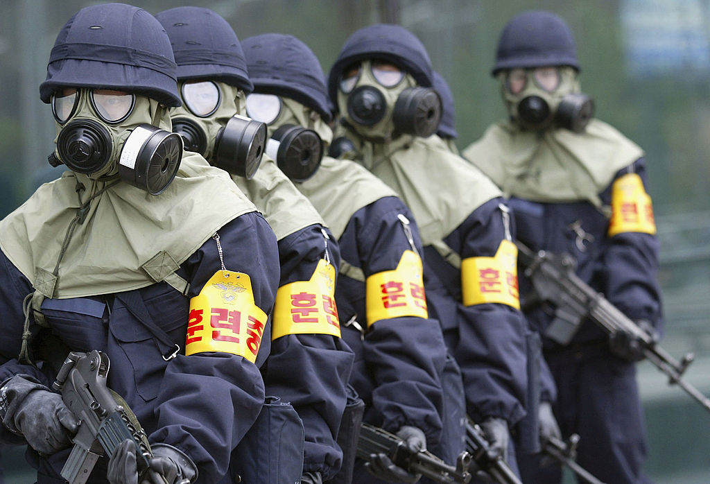 Soldiers Don Gas Masks in Counter-terrorism Drill