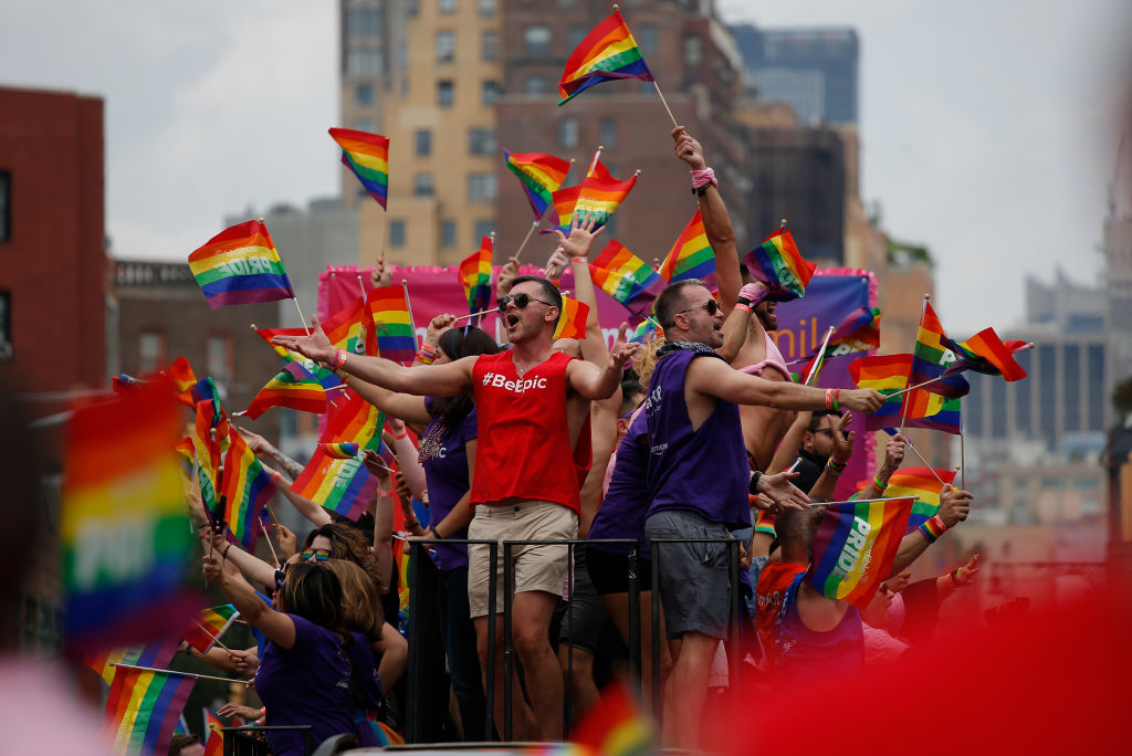 Revellers take part in the annual Pride Parade on June 24, 2018 in New York City. The first gay pride parade in the U.S. was held in Central Park on June 28, 1970.