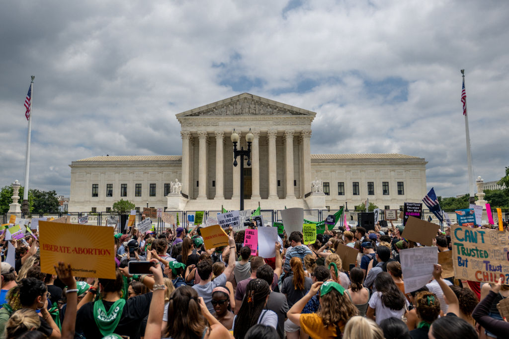 People protest in response to the Dobbs v Jackson Women's Health Organization ruling in front of the U.S. Supreme Court on June 24, 2022 in Washington, DC.