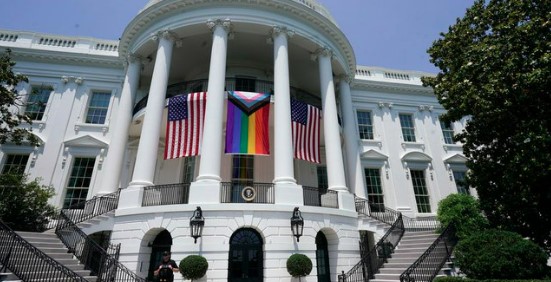 White House Hangs Pride Flag in Between Two American Flags to Celebrate Pride Month