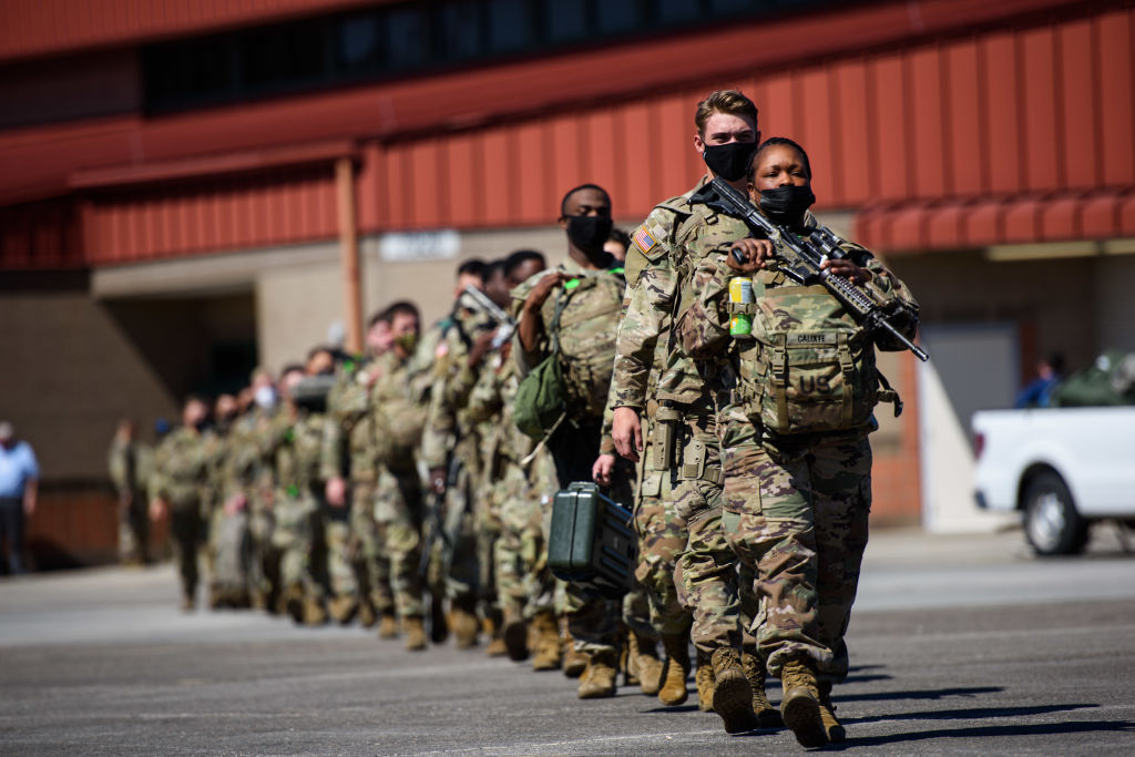 Members of the 1st Armored Brigade Combat Team, 3rd Battalion, 69th Armored Regiment deploy to Germany to reassure NATO allies, deter Russian aggression and to be prepared to support a range of other requirements in the region on March 2, 2022 in Savannah, Georgia. Roughly 7,000 soldiers will be deploying to Germany from the United States with 3,800 from the 3rd Infantry Division.