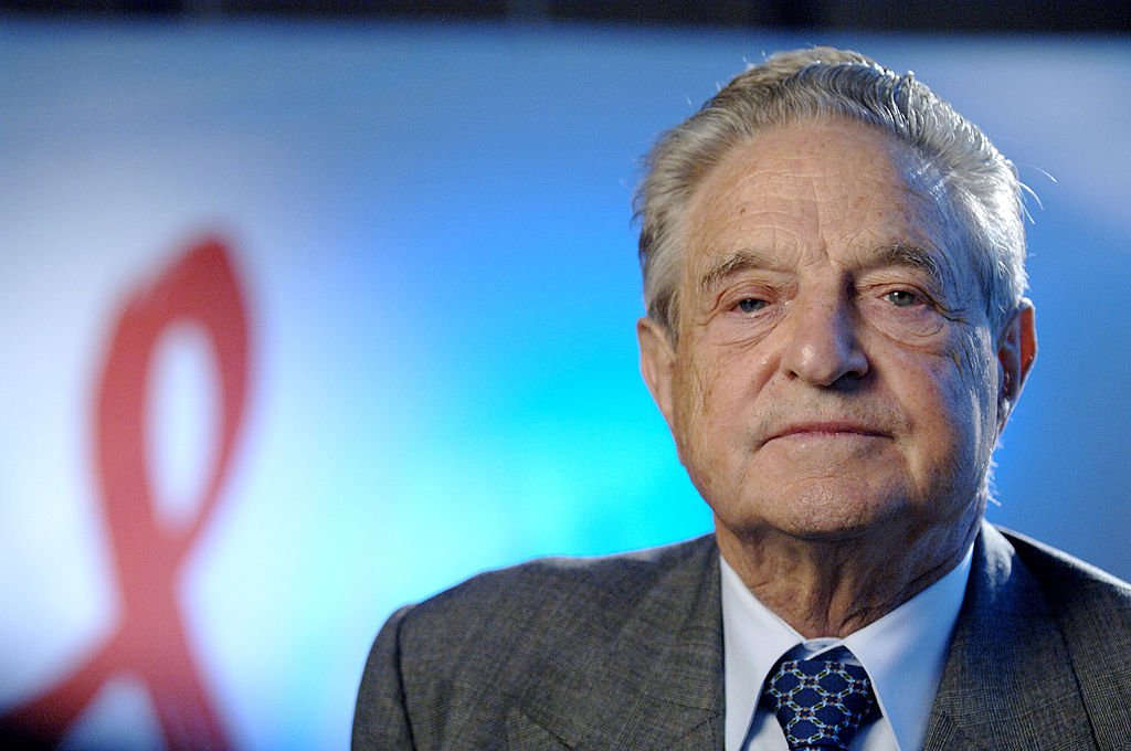 George Soros, CEO and Chairman of the Soros Foundations Network, speaks with Grant Clark of BET News about the contributions of his organization to the global fight against the AIDS pandemic, at the New York offices of the Soros Foundations Network on October 4, 2006 in New York City.