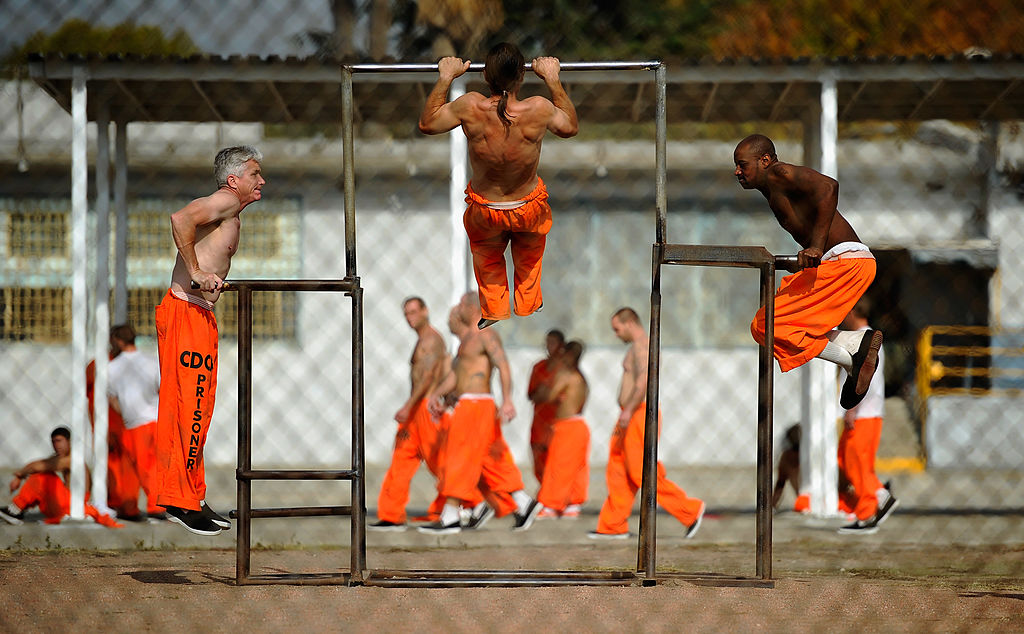 Inmates at Chino State Prison exercise in the yard December 10, 2010 in Chino, California.