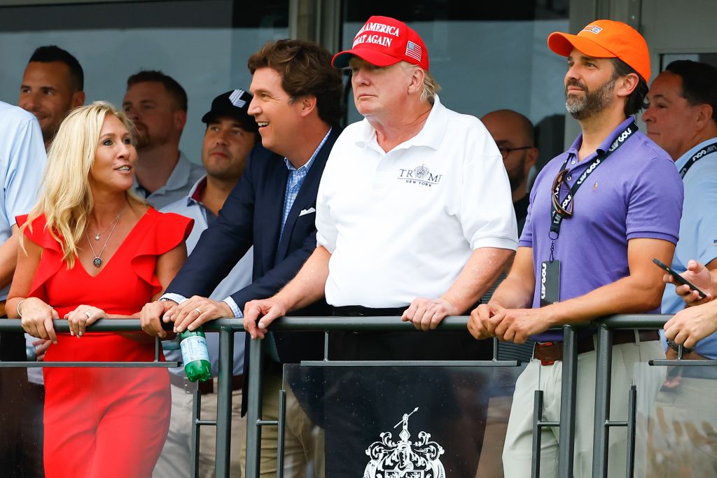 Former President Donald Trump, Tucker Carlson and Marjorie Taylor Greene during the 3rd round of the LIV Golf Invitational Series Bedminster on July 31, 2022 at Trump National Golf Club in Bedminster, New Jersey.