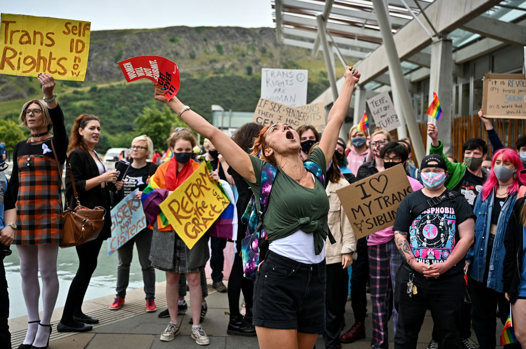 A woman’s rights demonstrator organised by Women Wont Wheesht stands in front of a counter demonstration by Trans Rights activists on September 02, 2021 in Edinburgh, Scotland.