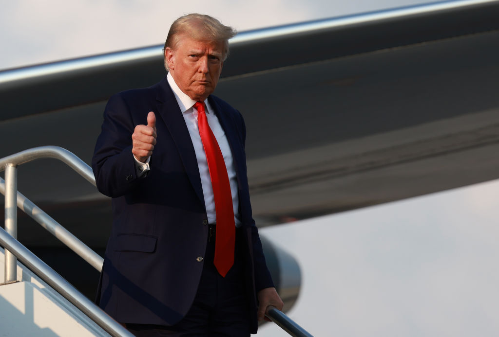 Former U.S. President Donald Trump arrives at Atlanta Hartsfield-Jackson International Airport on August 24, 2023 in Atlanta, Georgia.