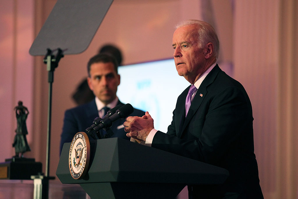 Hunter Biden (L) and U.S. Vice President Joe Biden speak on stage at the World Food Program USA's Annual McGovern-Dole Leadership Award Ceremony at Organization of American States on April 12, 2016 in Washington, DC.