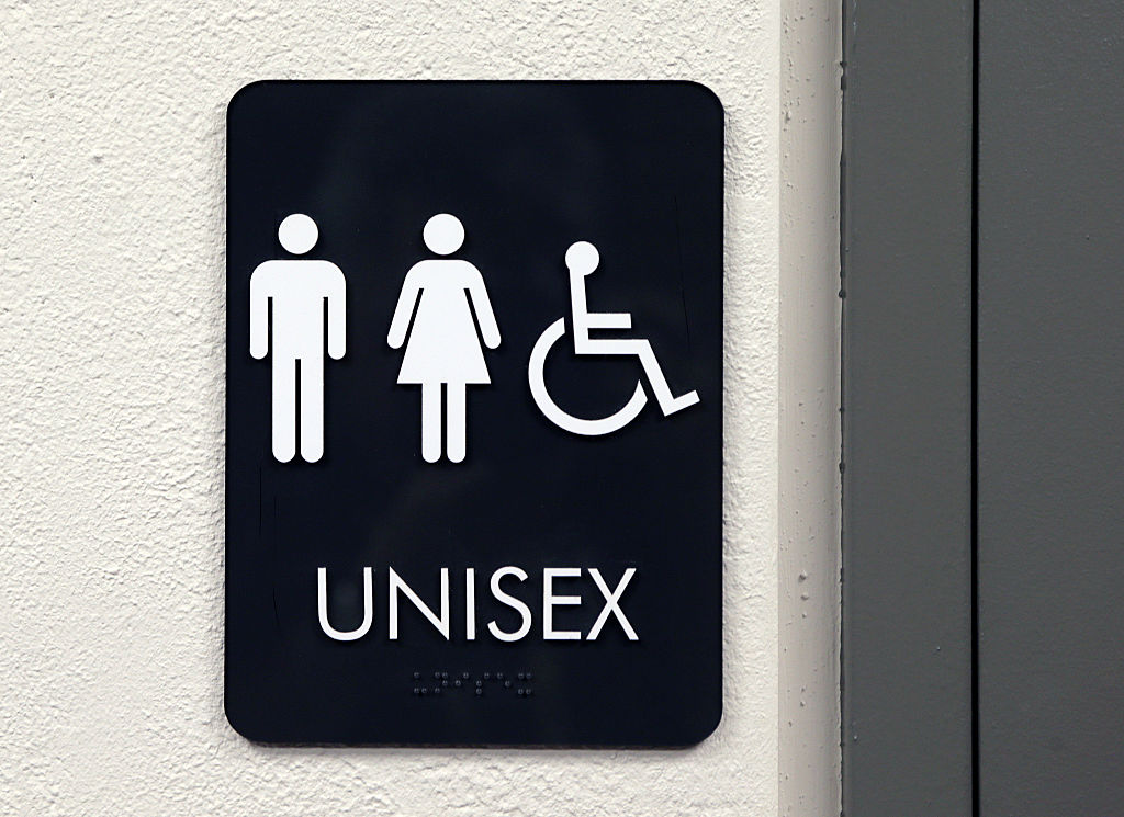 Some places have decided that the label unisex offers the simplest solution to the question of what restroom signs should say as transgender activists fight to use the facility that matches their identity.