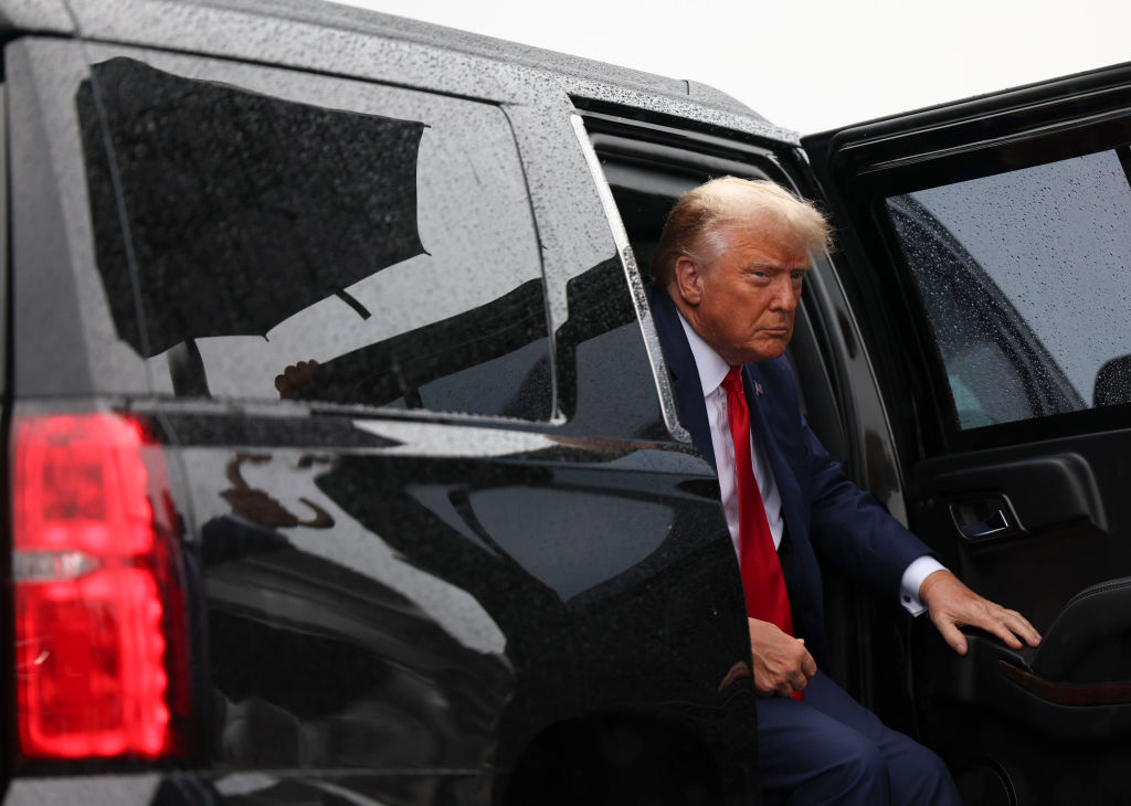 ARLINGTON, VA - AUGUST 3: Former president Donald Trump arrives at Ronald Reagan Washington National Airport in Arlington, Va. on Thursday, August 3, 2023 after appearing at E. Barrett Prettyman United States Court House. Former President Donald Trump pleaded not guilty Thursday to charges that he conspired to overturn the results of the 2020 election.