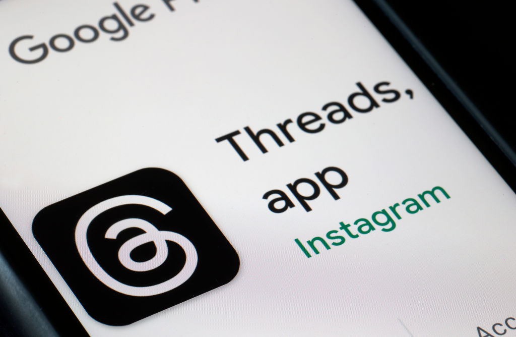 In this photo illustration, the logo of the social media application Threads is displayed on the screen of an iPhone on July 05, 2023 in Paris, France.