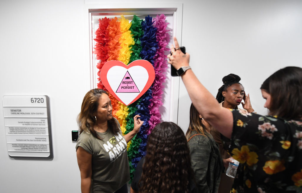 -Parents and school board members visit the office of Senator Caroline Menjivar on bills related to LGBTQ school curriculum Monday in Sacramento.