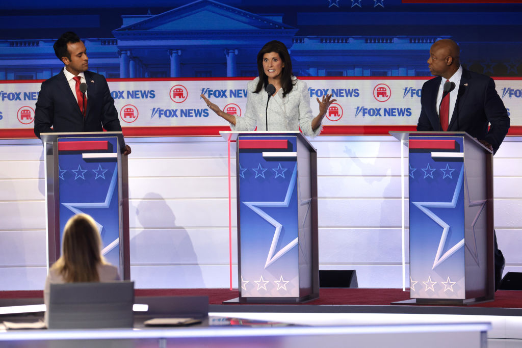 Republican presidential candidates (L-R), Vivek Ramaswamy, former U.N. Ambassador Nikki Haley and U.S. Sen. Tim Scott (R-SC) participate in the first debate of the GOP primary season hosted by FOX News at the Fiserv Forum on August 23, 2023 in Milwaukee, Wisconsin.