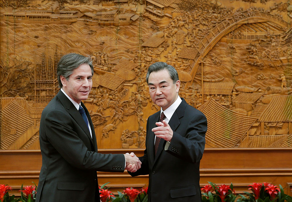 U.S. Deputy Secretary of State Antony Blinken shakes hand with Chinese Foreign Minister Wang Yi at the Olive Hall before a meeting at the Foreign Ministry office on February 11, 2015 in Beijing, Australia.