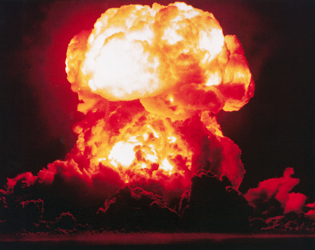 The detonation of the atomic bomb nicknamed "Smokey," as part of Operation PLUMBBOB in the Nevada desert. 1957.